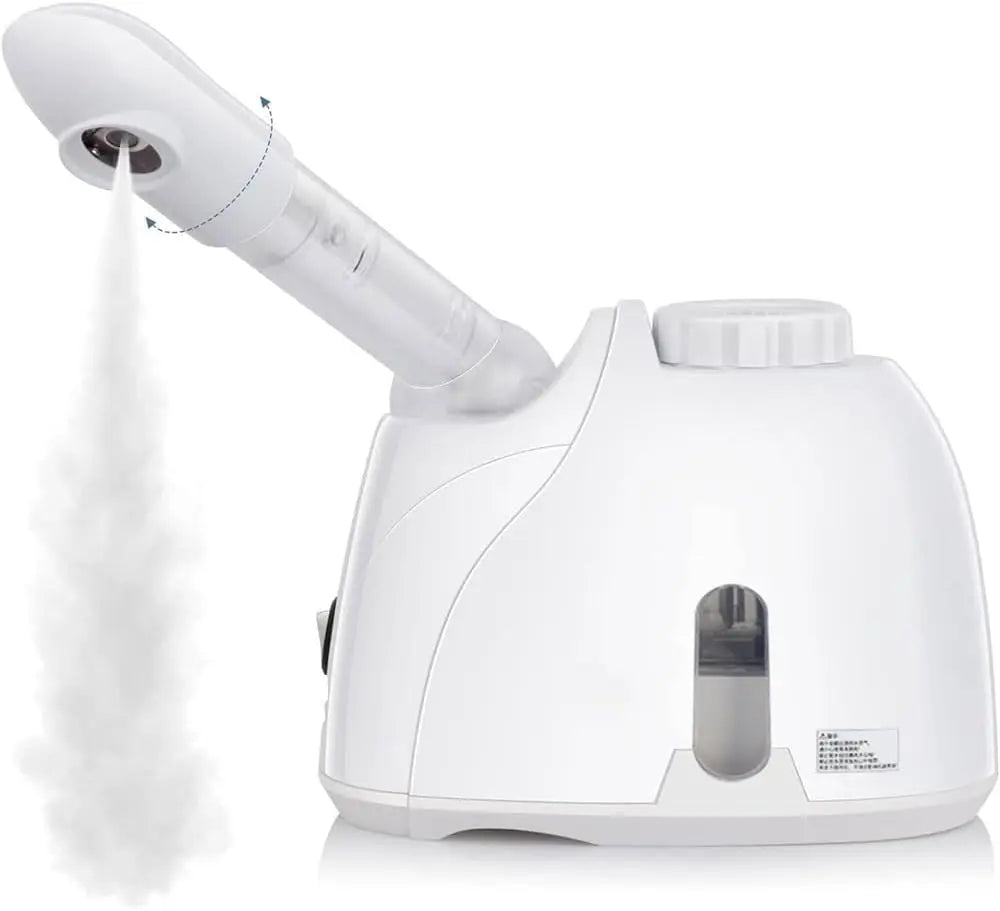 White ABS plastic facial steamer emitting warm mist from adjustable nozzle on plain background