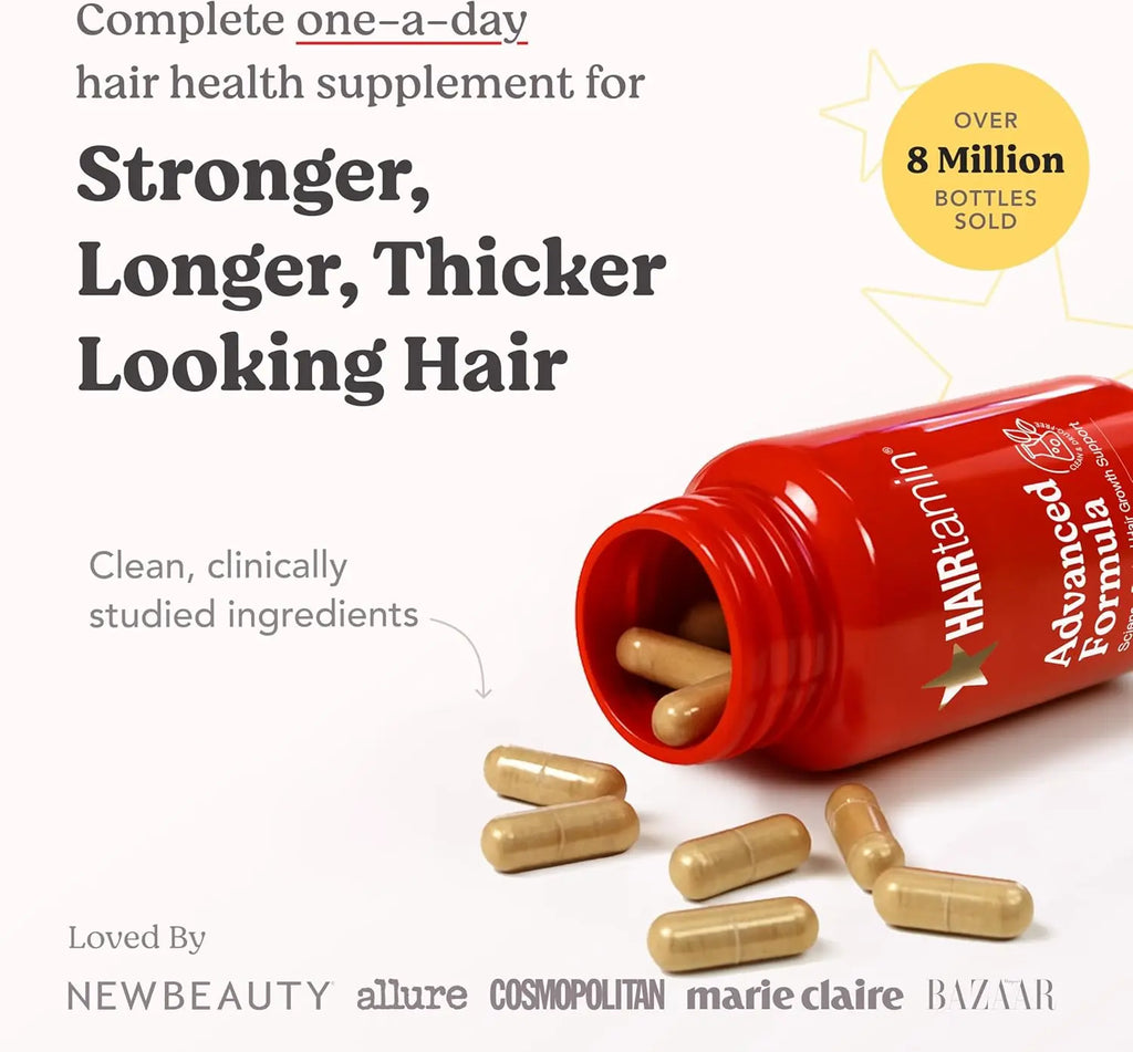 Spilled HAIRtamin capsules from red bottle showcasing clean clinically studied ingredients