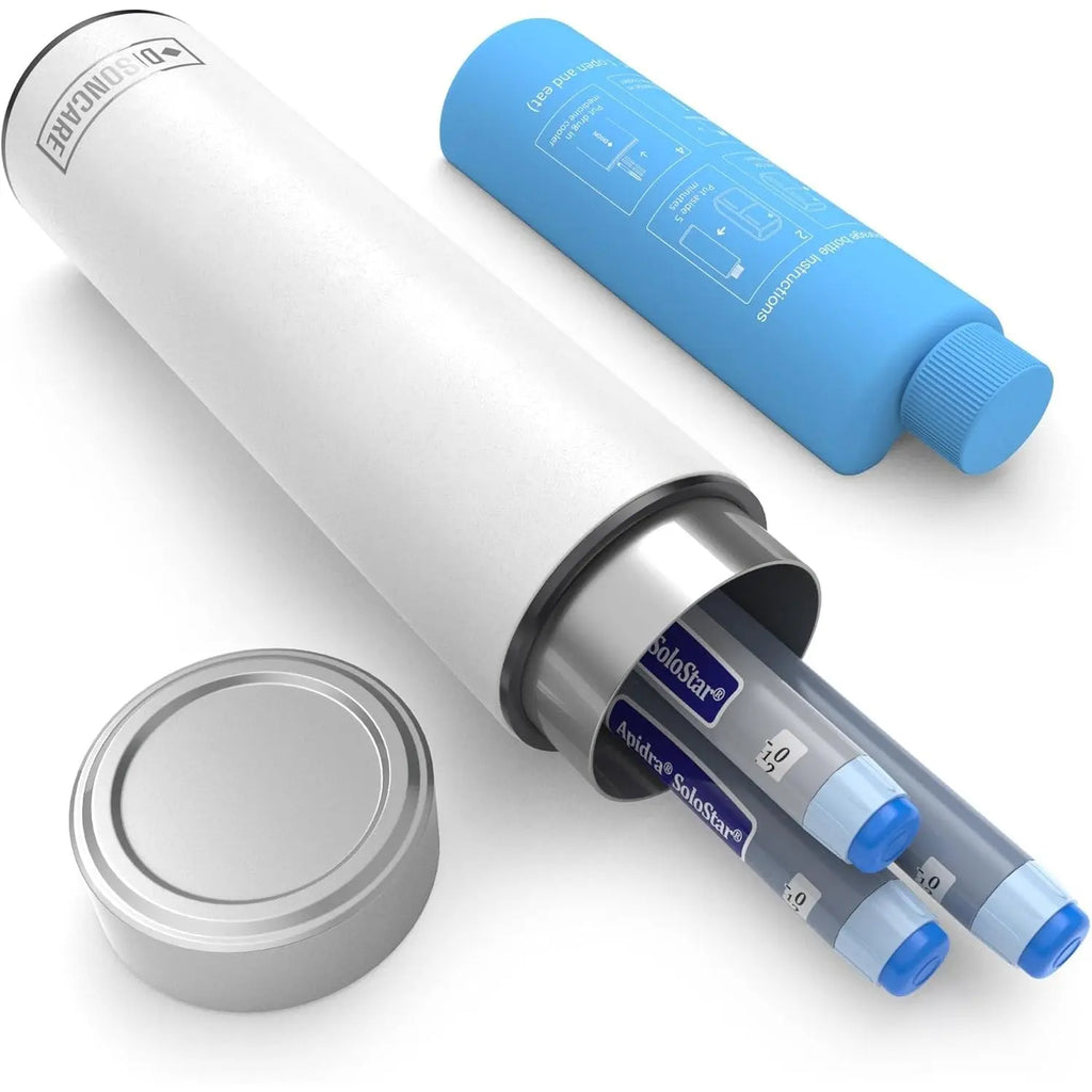 White DISONCARE cylindrical travel case open with two Anidra SoloStar insulin pens inside