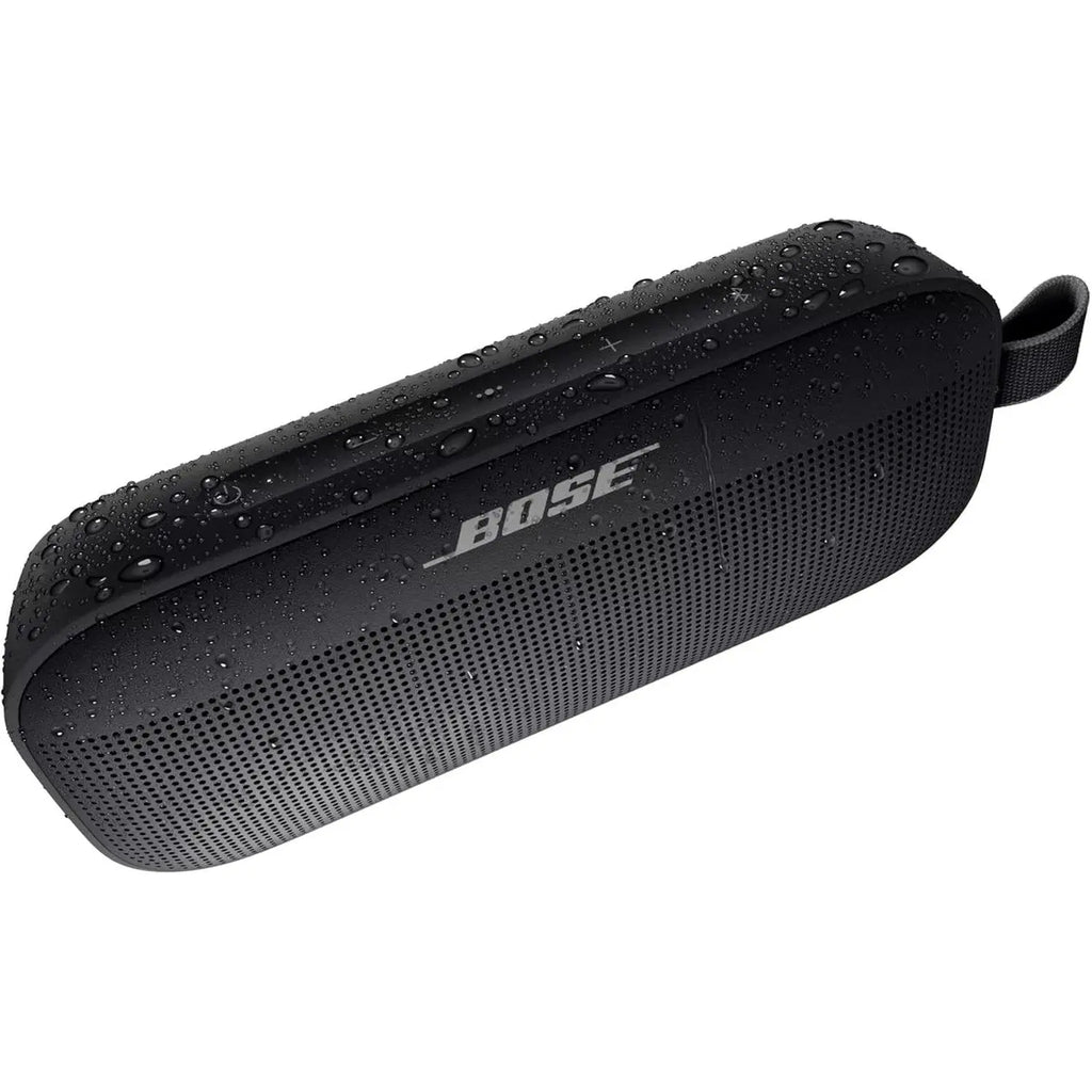 Water-resistant black Bose SoundLink Flex speaker with droplets on matte surface