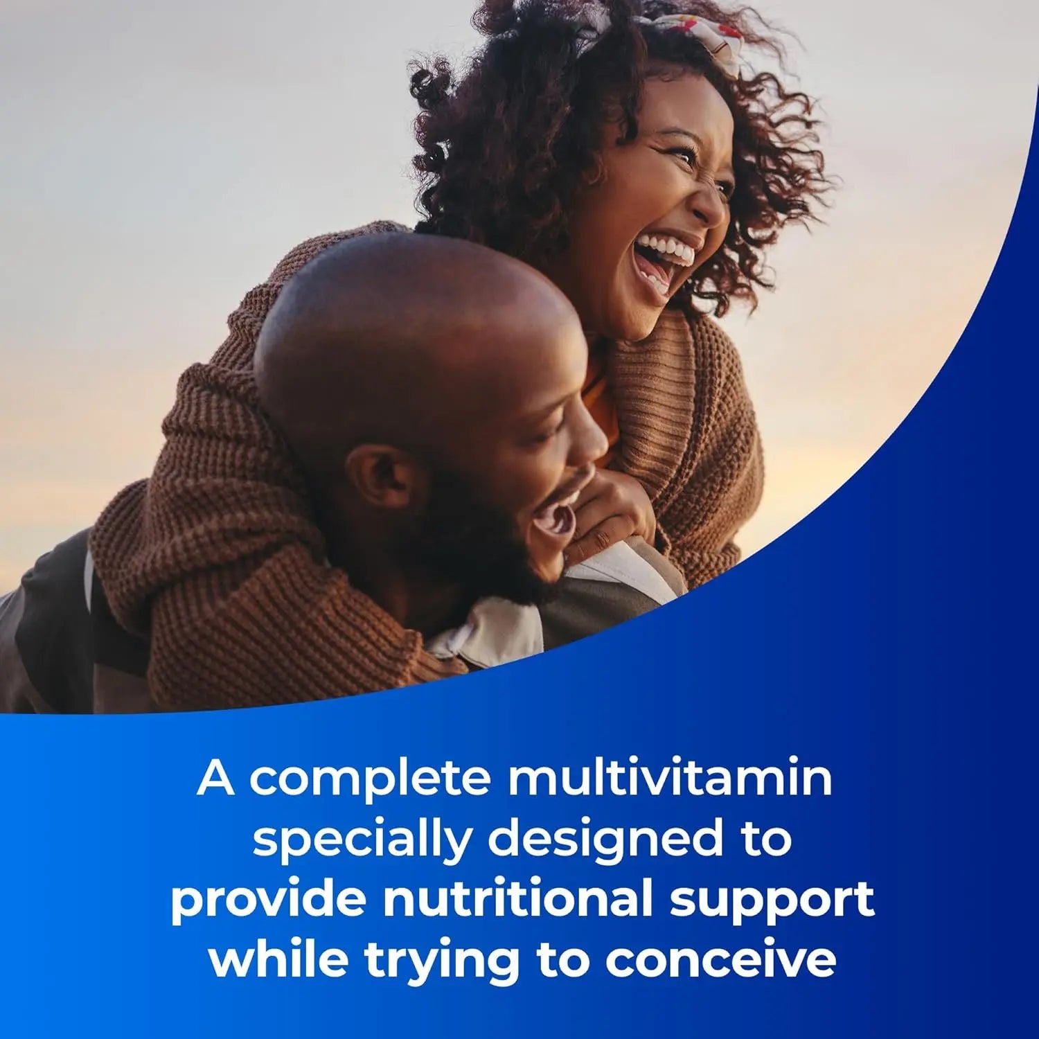 Couple trying to conceive wearing sweaters with One A Day multivitamin text overlay