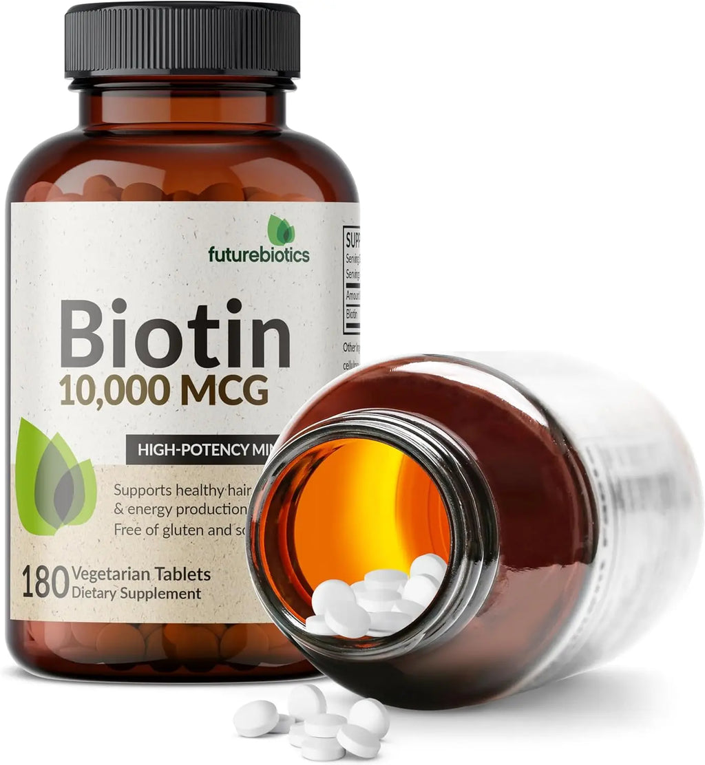 Futurebiotics Biotin 10,000 MCG mini tablets spilling from amber bottle