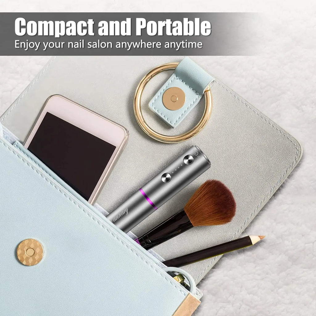 Compact gray cordless nail drill in portable leather pouch for travel-friendly salon use