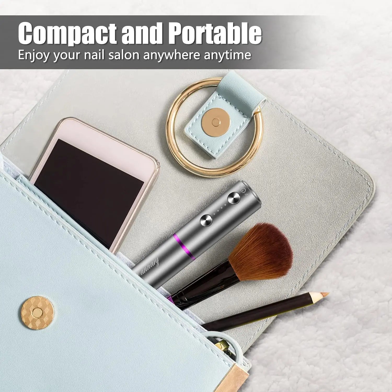 Compact gray cordless nail drill in portable leather pouch for travel-friendly salon use